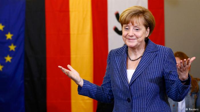 Канцлер ФРГ и глава ХДС Ангела Меркель празднует победу Канцлер Германии и глава ХДС Ангела Меркель празднует победу