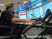 Российские акции растут, индекс РТС превысил 900 пунктов